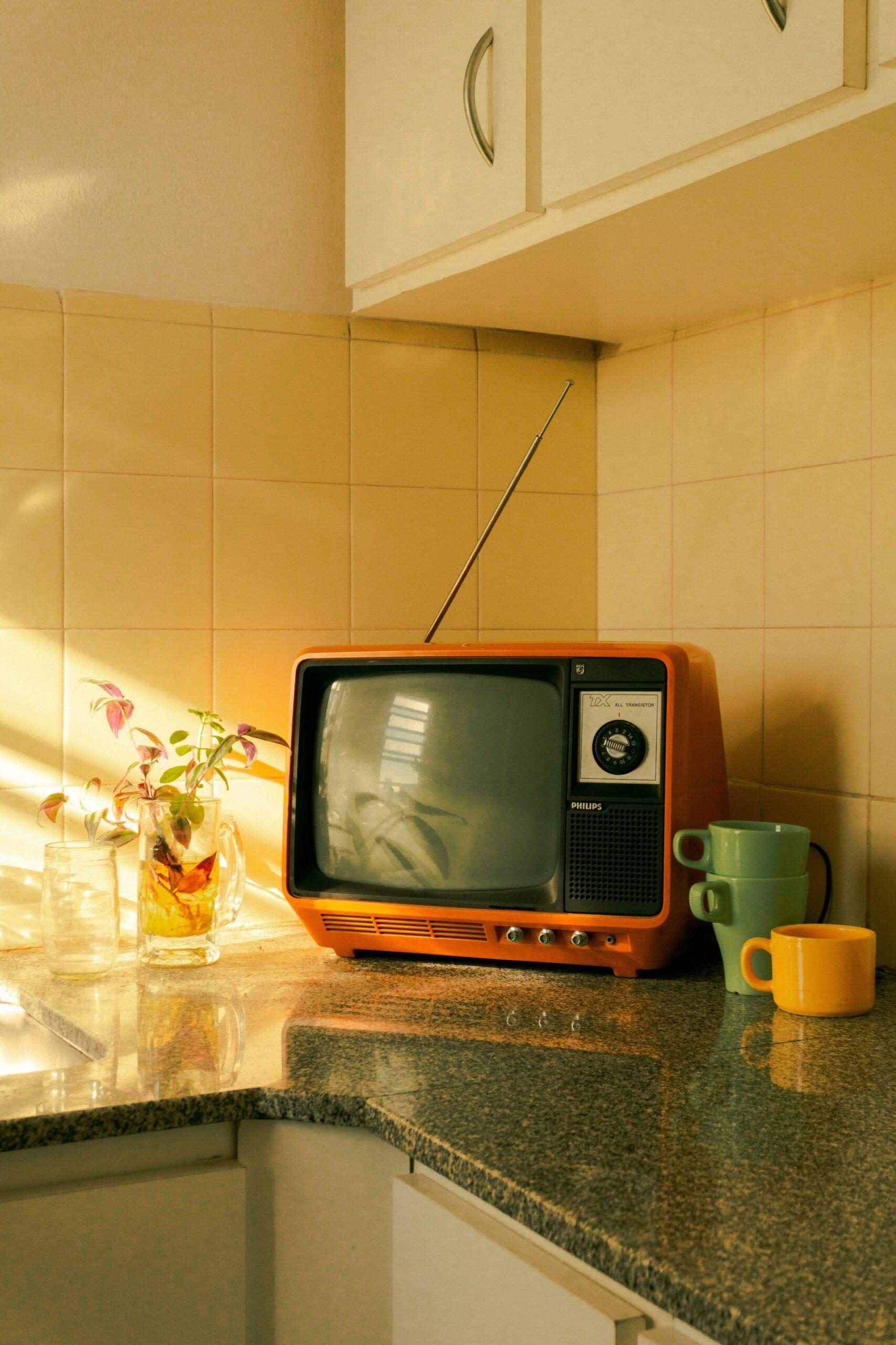 An old TV set in a kitchen