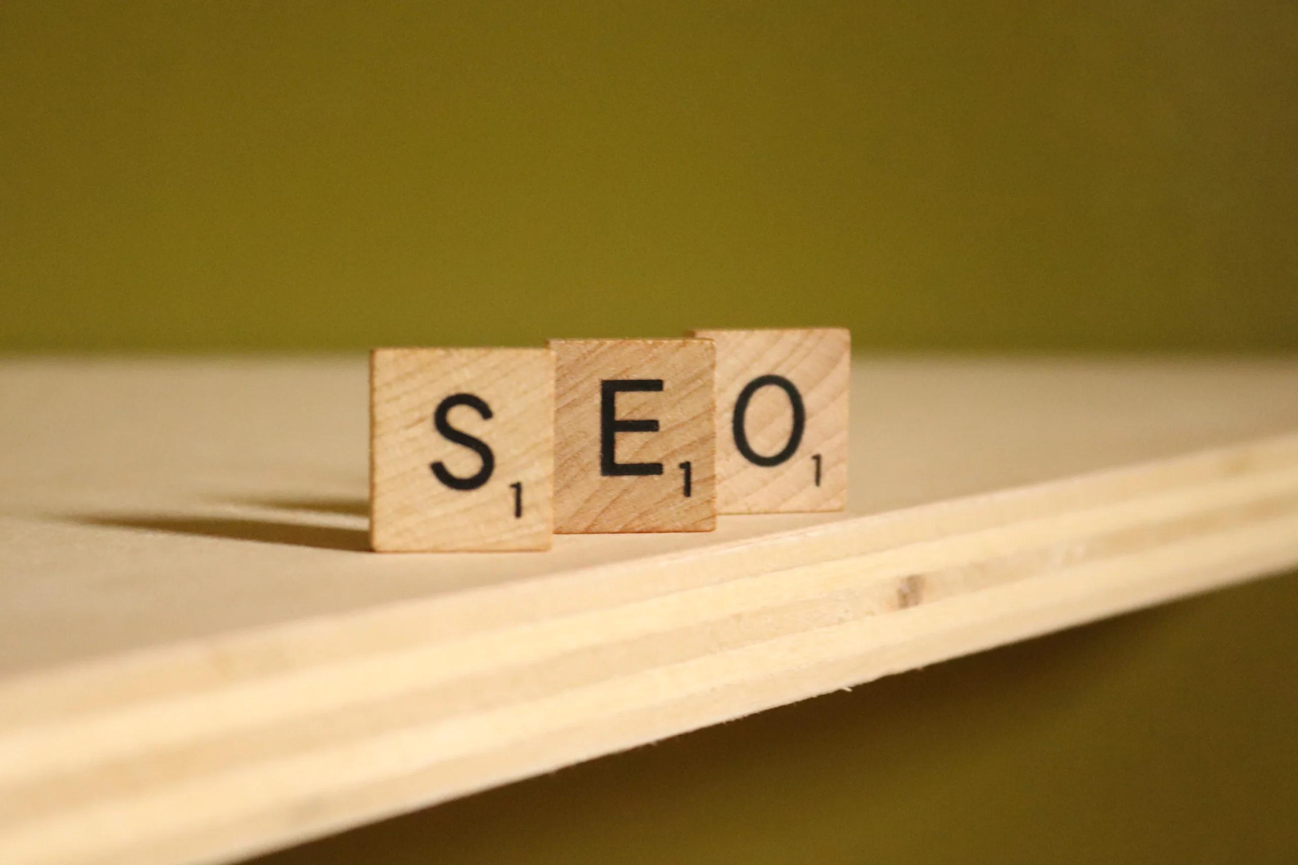 A wooden block that says, SEO