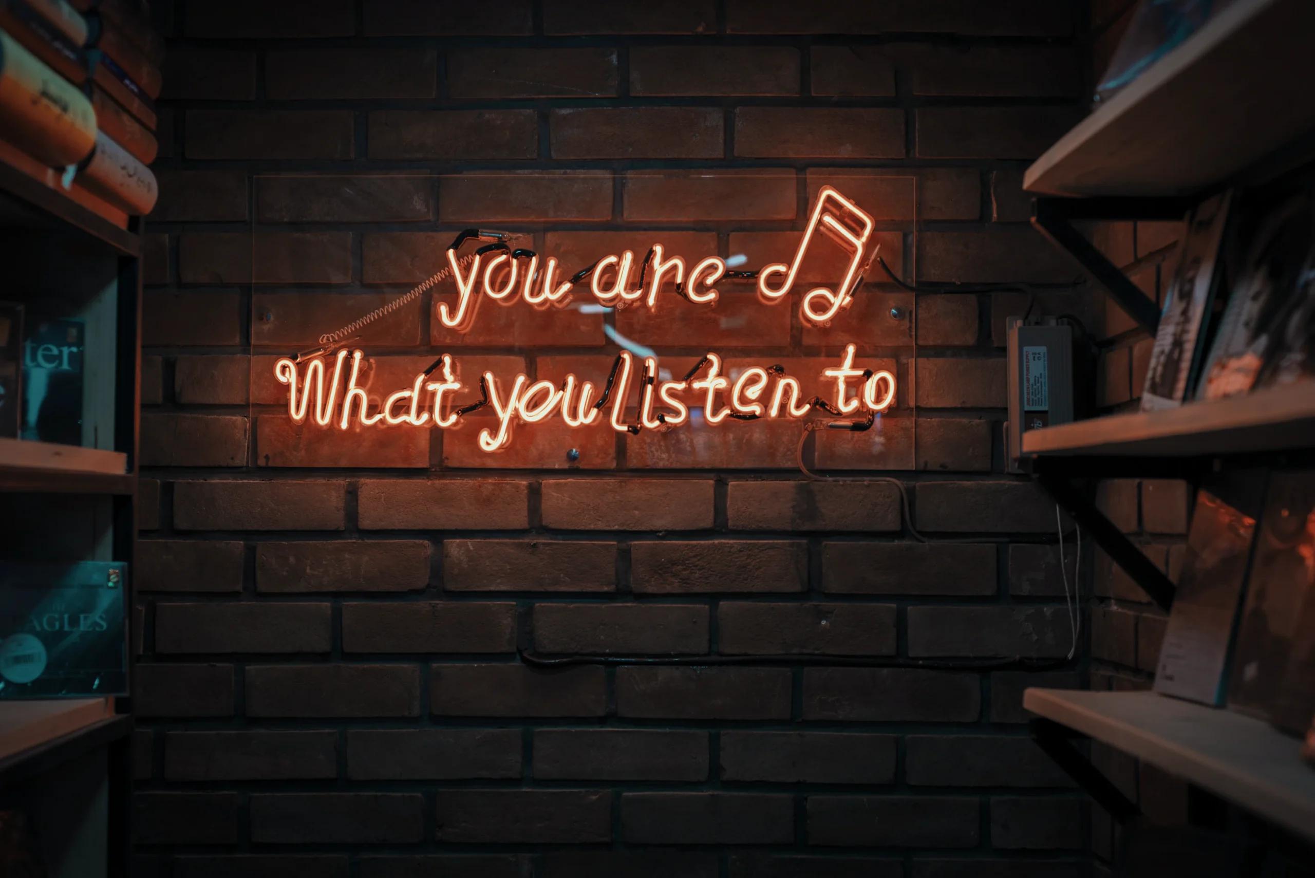A sign that sees "you are what you listen to"